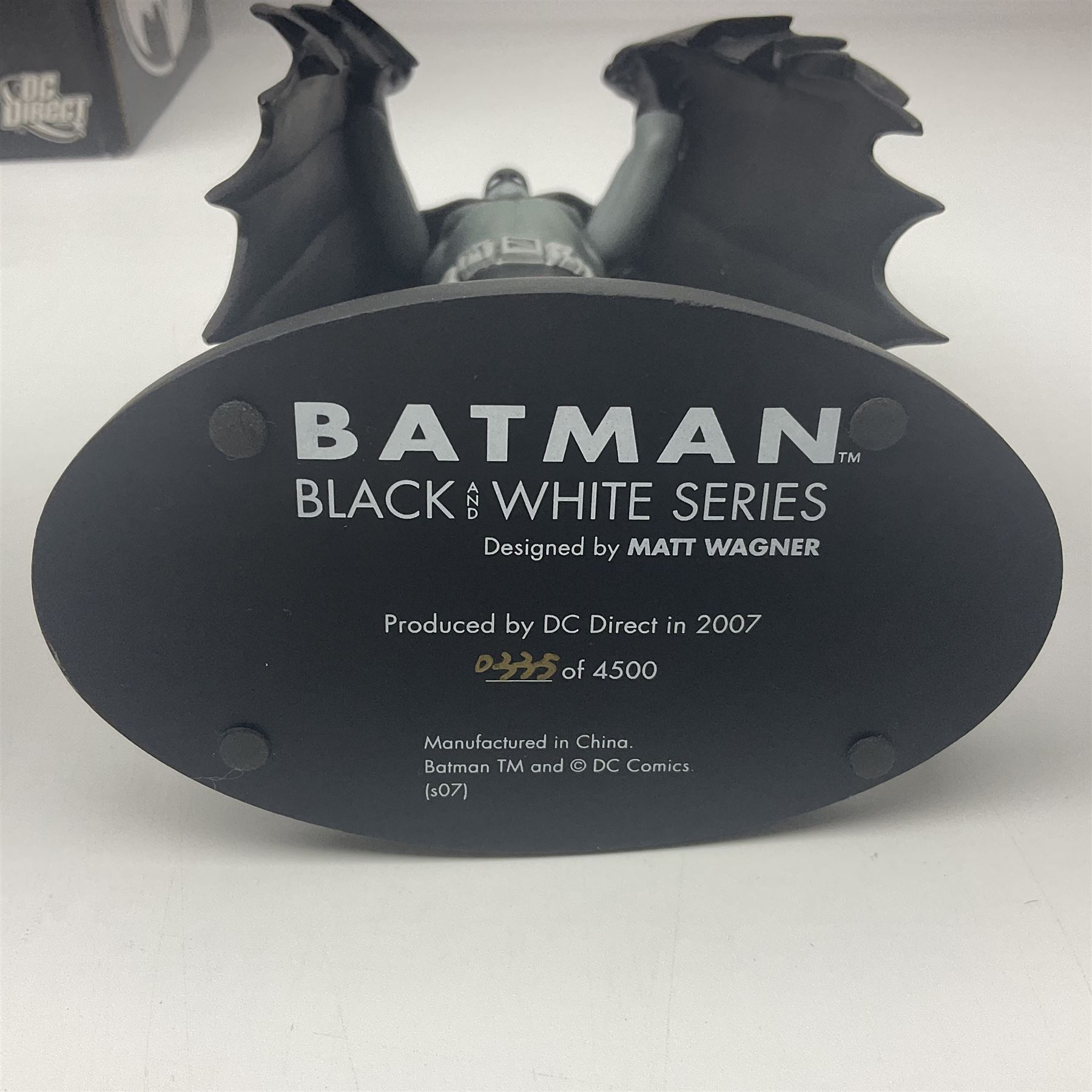 Group of five limited edition DC Direct Black and White Batman hand-painted cold-cast porcelain statues in original boxes, with two similar examples from DC Collectibles 