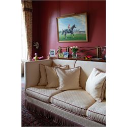 Grande Knole four-seat sofa, upholstered in geometric lozenge pattern cream fabric with burgundy and cream twist piping and fringe, on castors