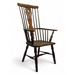 19th century provincial elm and beech Windsor armchair, shaped cresting rail over stick ba...