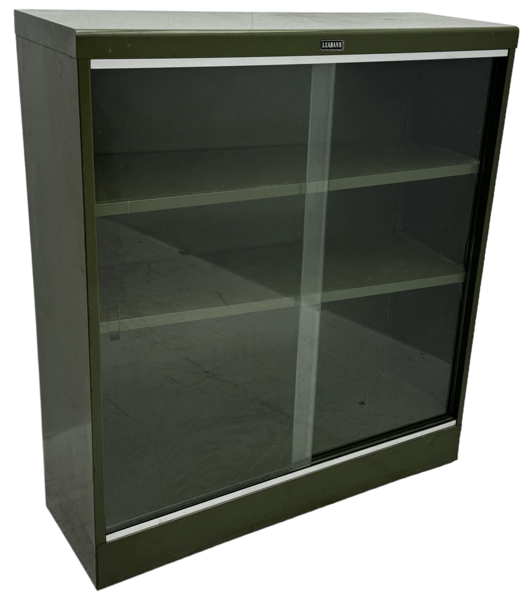 Mid-20th century 'Leabank' metal display cabinet, two sliding glass doors enclosing two adjustable metal shelves, olive green finish with chrome trim