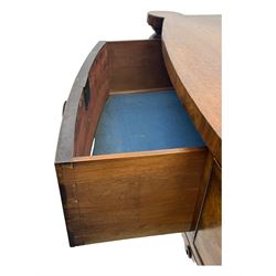 Early Victorian mahogany bow front chest, two short over three long graduating cockbeaded drawers, flanked by faceted columns with carved acanthus leaf capitals, standing on turned bun supports with fluted detailing