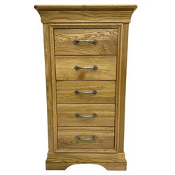 Contemporary light oak pedestal chest, moulded cornice and chamfered rectangular top with rounded fronts, over five drawers with metal handles and cock-beaded surrounds, on bracketed plinth base