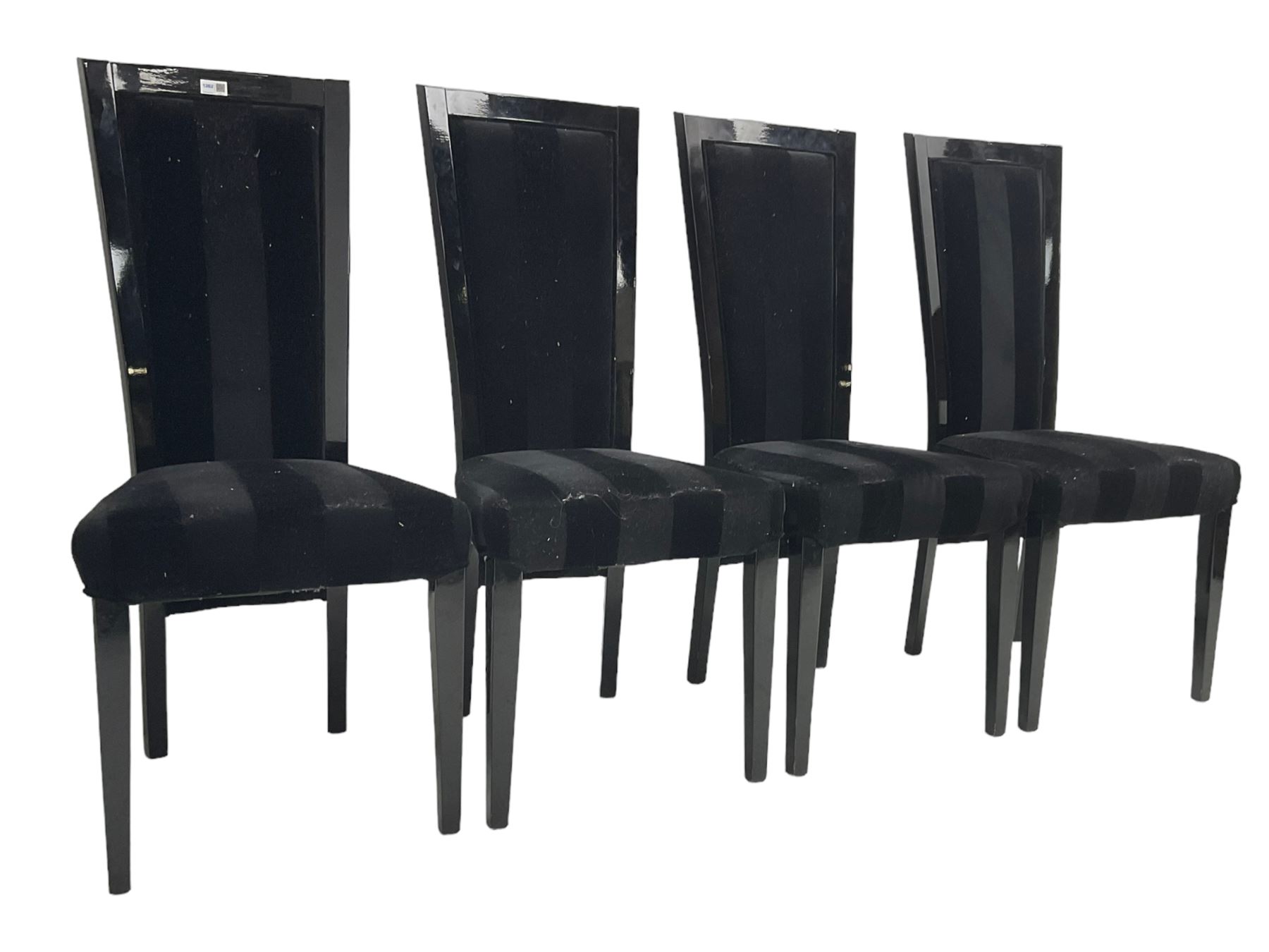 Set of four contemporary ebonised high back dining chairs, upholstered in black velvet fabric