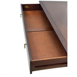 Stag Minstrel - mahogany chest of drawers, rectangular top over three drawers with brass ring pulls, on bracket feet