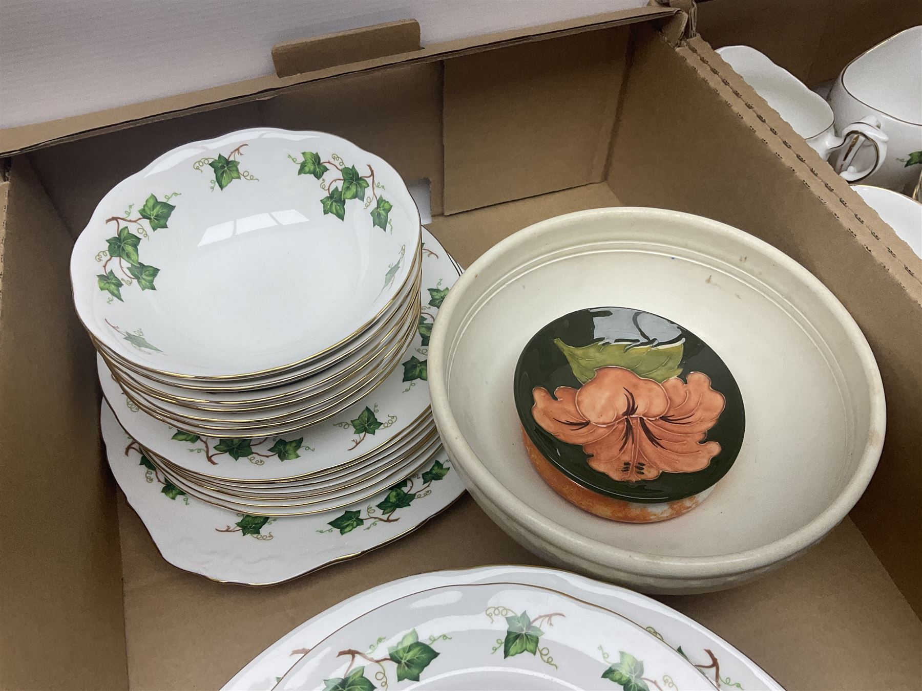 Moorcroft Hibiscus pattern trinket dish, together with Edinburgh Crystal wine glasses, Colclough ivy pattern tea and dinner wares etc, in three boxes 