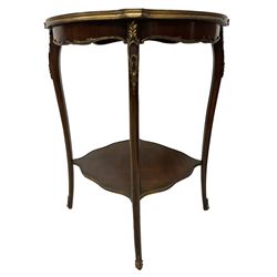 Early 20th century French two-tier marquetry inlaid walnut side table, shaped circular top with gilt metal edge, central chequered inlaid circular panel with floral motif, raised on cabriole supports with gilt metal mounts, united  by undertier