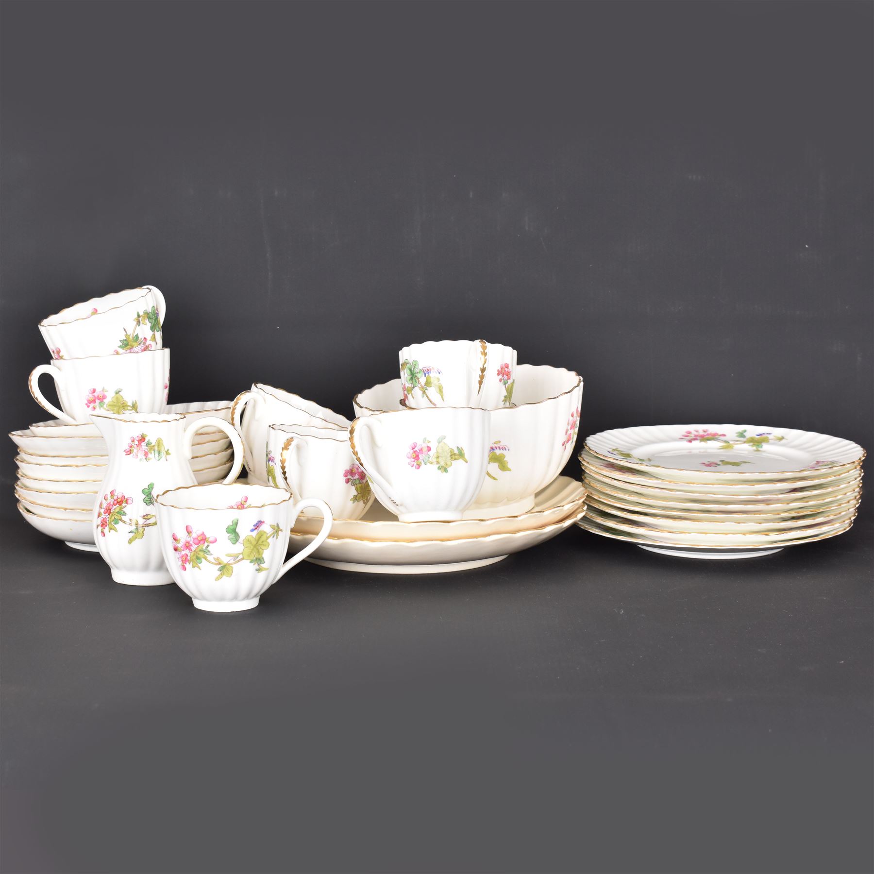 Coalport part tea service, decorated with floral sprigs, including eight cups and saucers, milk jug, eight dessert plates etc  