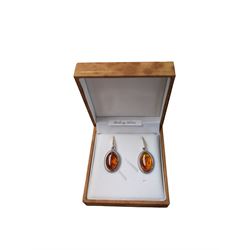 Pair of silver and Baltic amber oval pendant earrings, stamped, boxed 