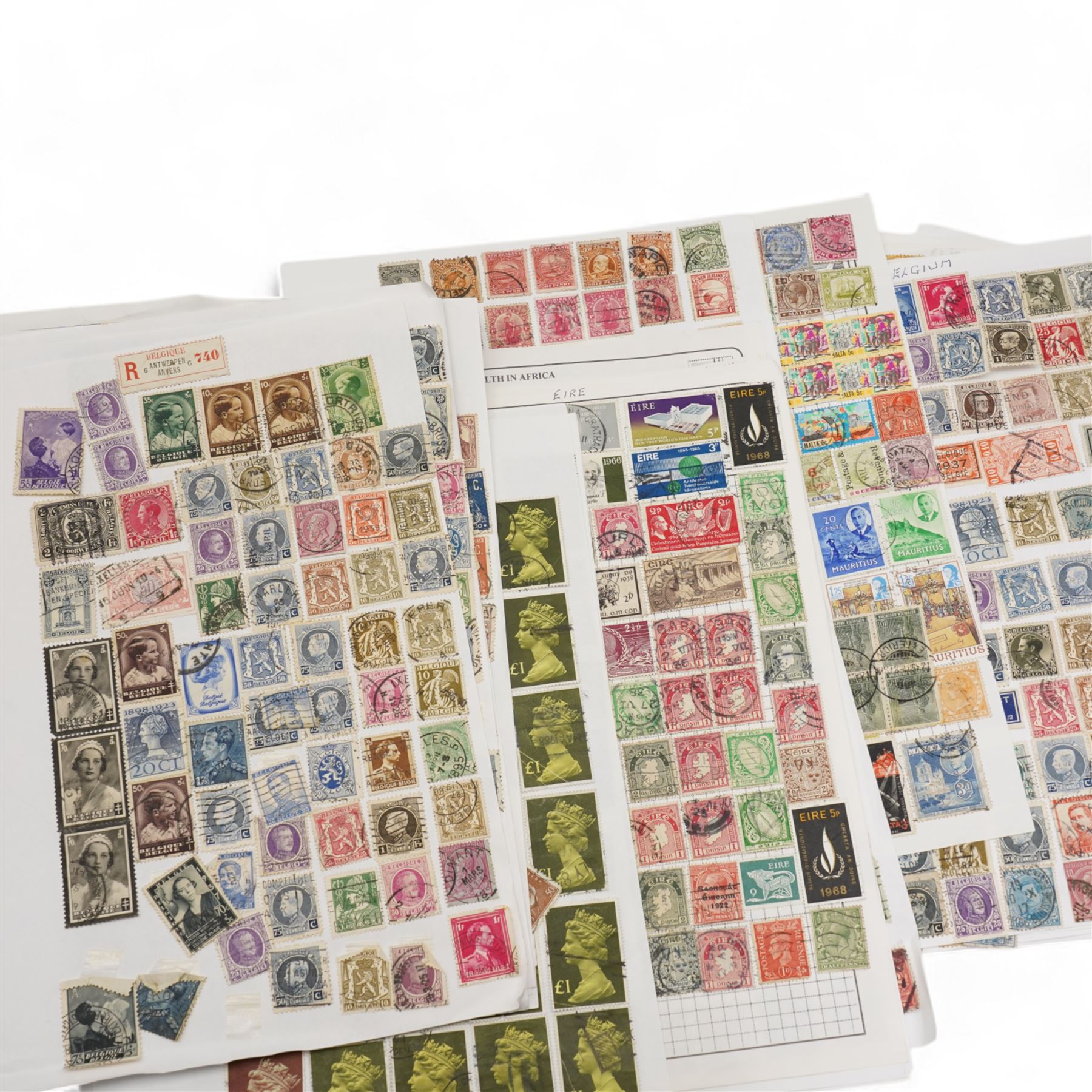 World stamps on album pages and stockcards, including King George V Nigeria with higher values, Western Australia, Pitcairn Islands, St Helena, Zanzibar, Aden, Gibraltar, Canada, United States of America, Cayman Islands, Grenada etc