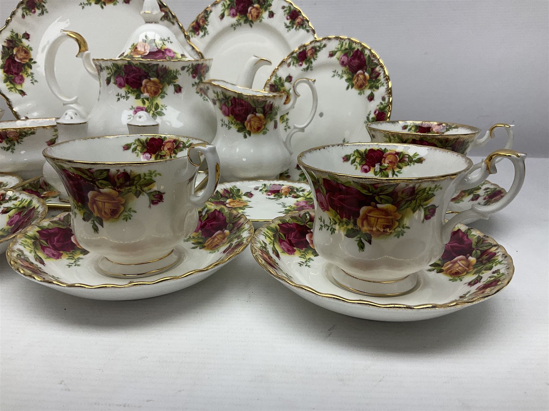 Royal Albert Old Country Roses, tea service for six, comprising teapot, milk jug, open sucrier, teacups and saucers, cake plate, together with other items 