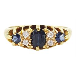 Early 20th century 18ct gold three stone sapphire and four stone old cut diamond ring