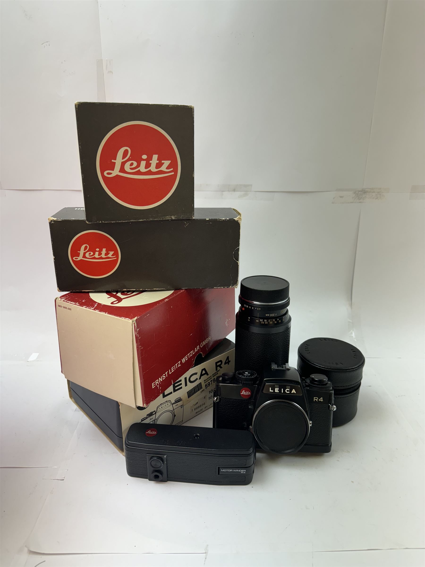 Leica R4 SLR camera body, serial no. 1609604, together with  with Leitz Vario Elmar-R 1:4 5/75 - 200mm and Elmarit -R 1:2 8/35mm lenses, and Motor Winder R4 14282, all in original boxes