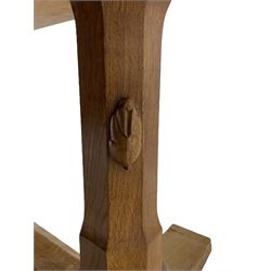 Rabbitman - oak dining table, rectangular adzed top, twin octagonal pillar supports on sledge feet, united by floor stretcher, carved with rabbit signature, by Peter Heap of Wetwang 