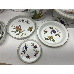 Royal Worcester Evesham pattern, including covered pot de cremes, twin handle tureen, serving dishes, flan dishes, side plates etc  