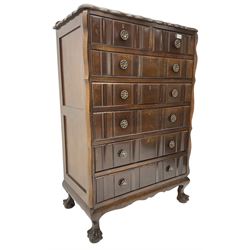 Early 20th century Dutch design mahogany chest, raised back over shaped top, fitted with two short and five long drawers, raised on ball and claw feet