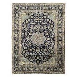 Persian Kashan indigo ground rug, central floral pattern pole medallion, the field decorat...