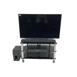 Panasonic TX-42AS600B 42'' television, Panasonic SU-HTB18 sound bar and speaker, Panasonic HDD Recorder DMR-HW120, television stand, and two remotes 