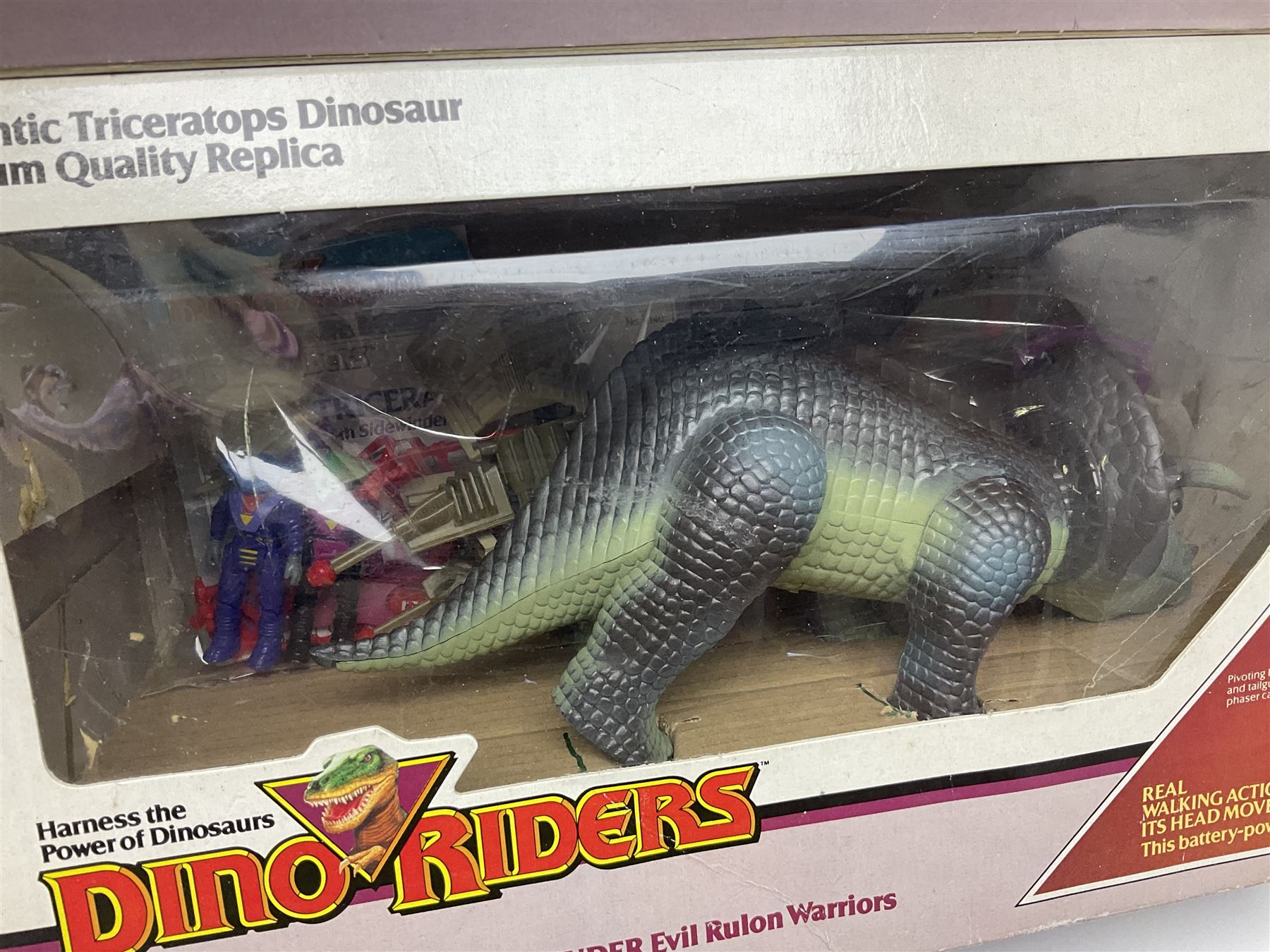 Dino-Riders 1980s by Tyco Action-GT, Stegosaurus with Tark and Vega Heroic Dino-Riders; Triceratops with Hammerhead and Sidewinder Evil Rulon Warriors; and Struthiomimus with Nimbus Heroic Dino-Rider; all boxed; two Action Figures, re-bagged on original card backing; and two VHS video tapes (6)