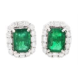 Pair of 18ct white gold octagonal cut emerald, round and baguette cut diamond cluster stud...