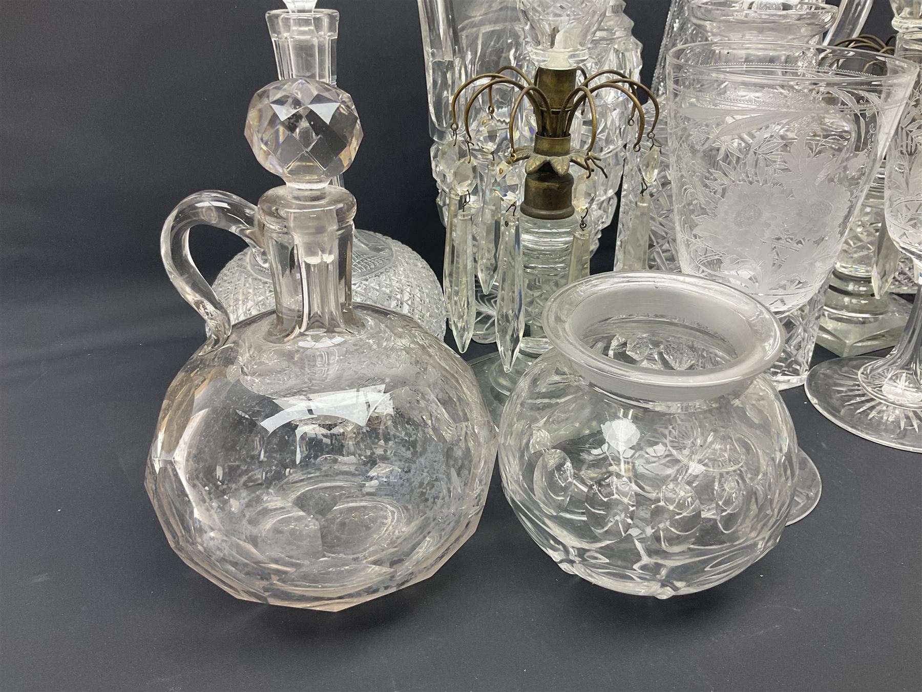 Collection of 18th century and later cut glass, including a pair of Victorian onion shaped decanters with elongated necks and hobnail cut decoration, together with a similar jug, of tapering form with C handle and an Georgian cut glass jug, with stepped decoration to neck and square cut decoration to body, tallest jug H30cm