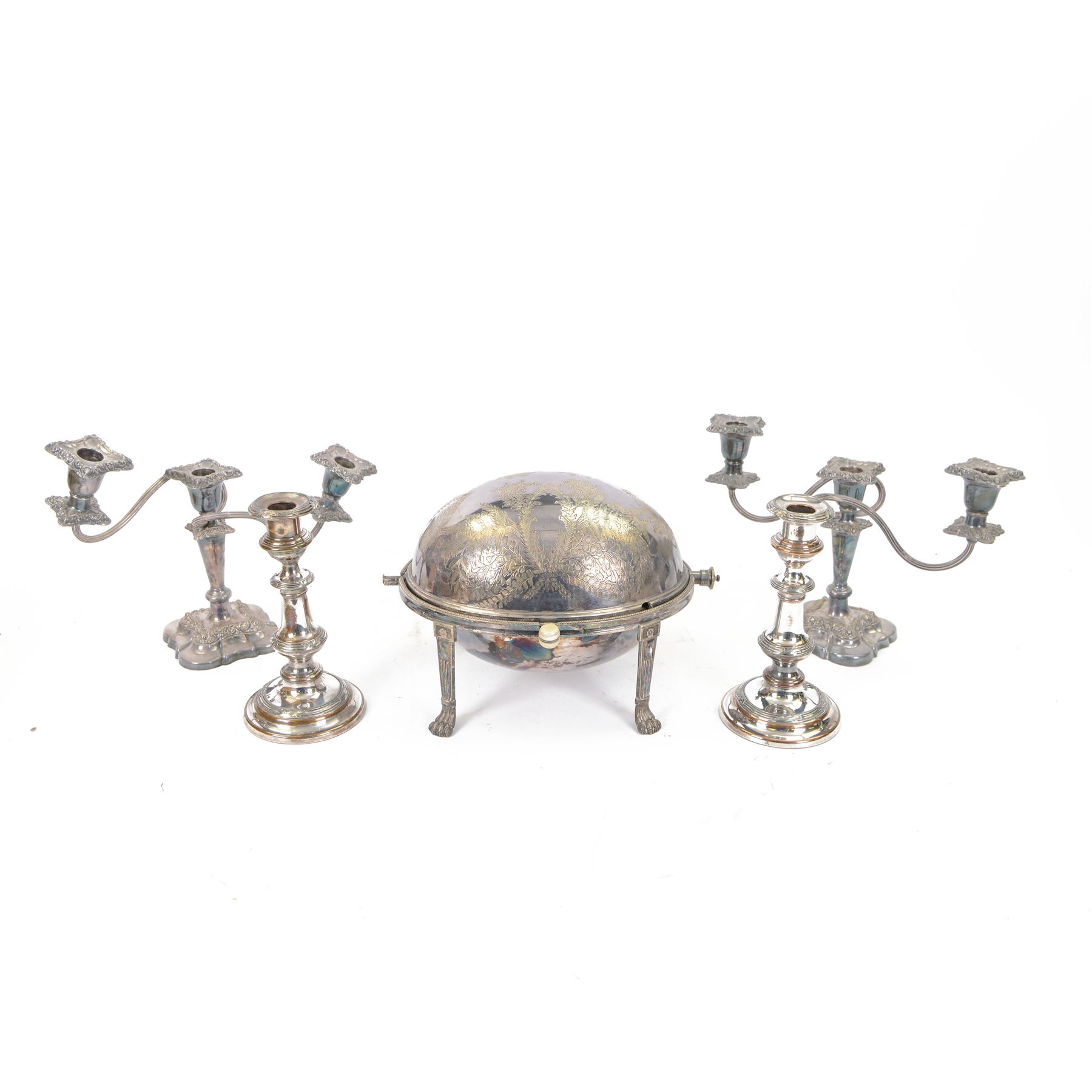 Walker and Hall turnover dish, engraved throughout with foliate decoration, with ivorine handle and upon four paw feet, together with a pair of silver plated candelabra and a pair of silver plated candlesticks, tallest H20cm