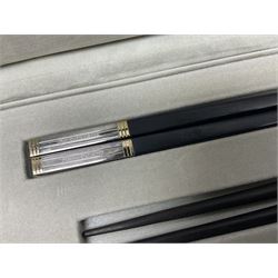 Set of eight silver plated ebony chopsticks by Christofle France, in presentation case