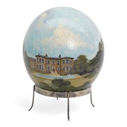 Stella Reading - Ostrich egg painted with a view of Copgrove Hall with the stables and grounds and on a plated stand, signed and dated 1985 H16cm overall