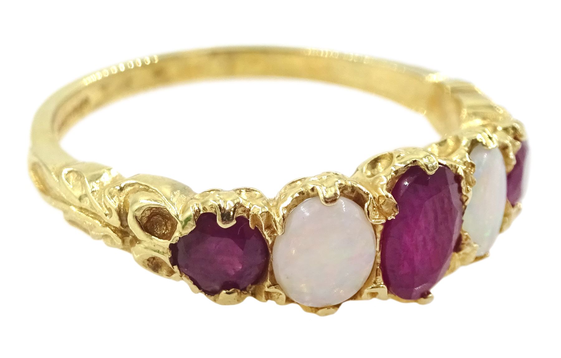 14ct gold five stone oval cut ruby and opal ring, London 2006