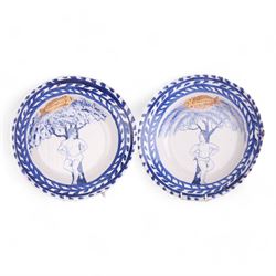 Hylton Nel (1941-); Two bowls, 1999, each decorated internally with a figure of a man stoo...