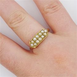 Early 20th century gold milgrain set two row split pearl ring, stamped 18ct