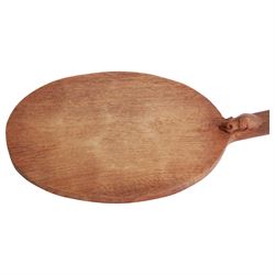 Mouseman - adzed oak cheeseboard, oval form with projecting handle carved with mouse signature, by the workshop of Robert Thompson