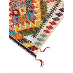 Chobi Kilim rug, pale ground and decorated with multi-coloured geometric pattern 