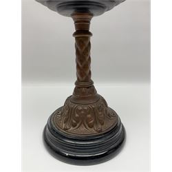 Victorian oil lamp, the faceted reservoir upon embossed copper stem and stepped circular ceramic base, with etched floral glass shade