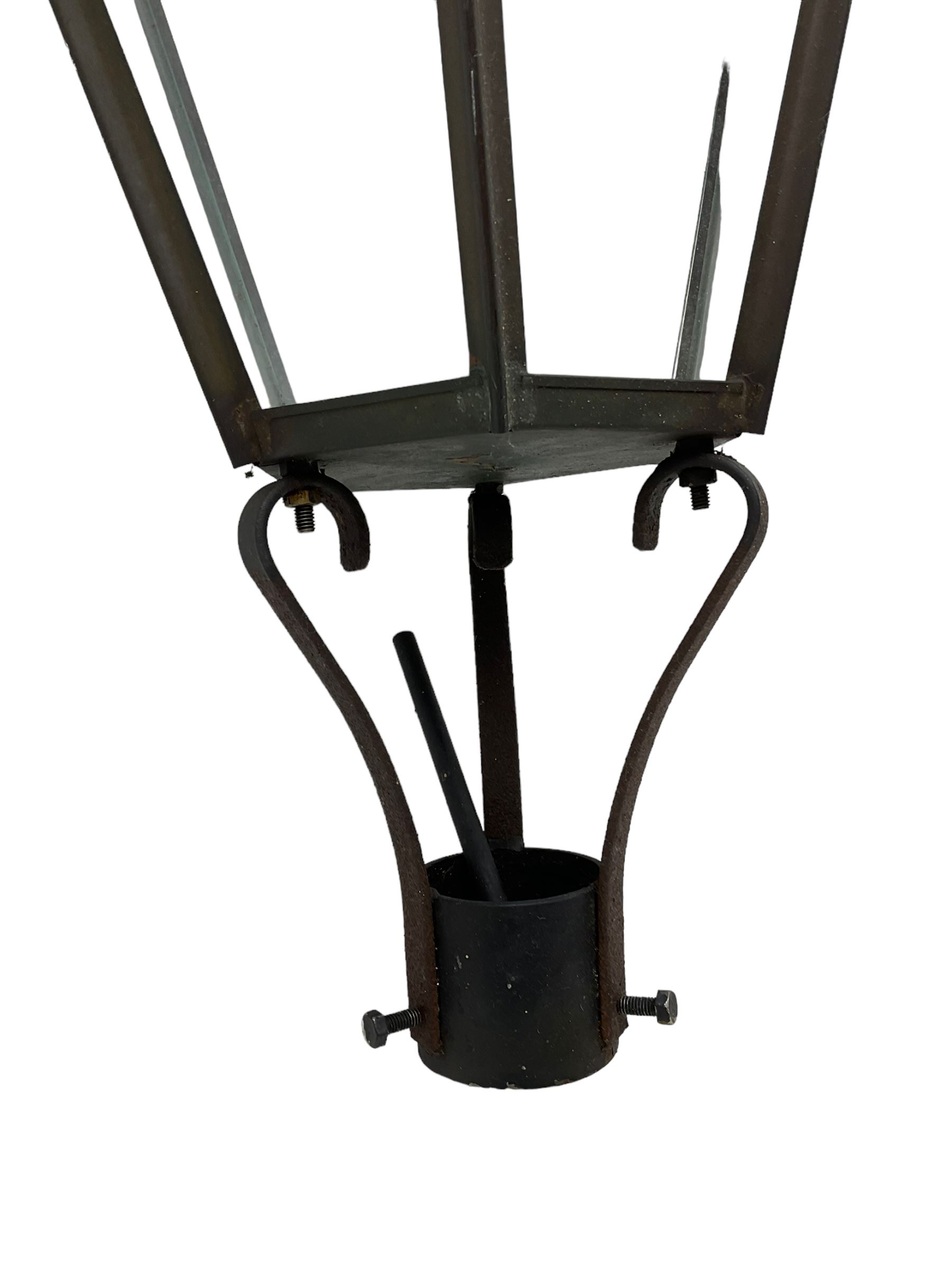 Victorian design six glass lantern, hexagonal tapered from with finial, scrolled lower supports on bracket