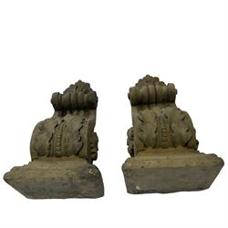 Pair of Victorian design cast stone architectural corbel wall brackets, stepped rectangular top over a scrolled bracket with relief acanthus leaf decoration and rosette motifs to the side