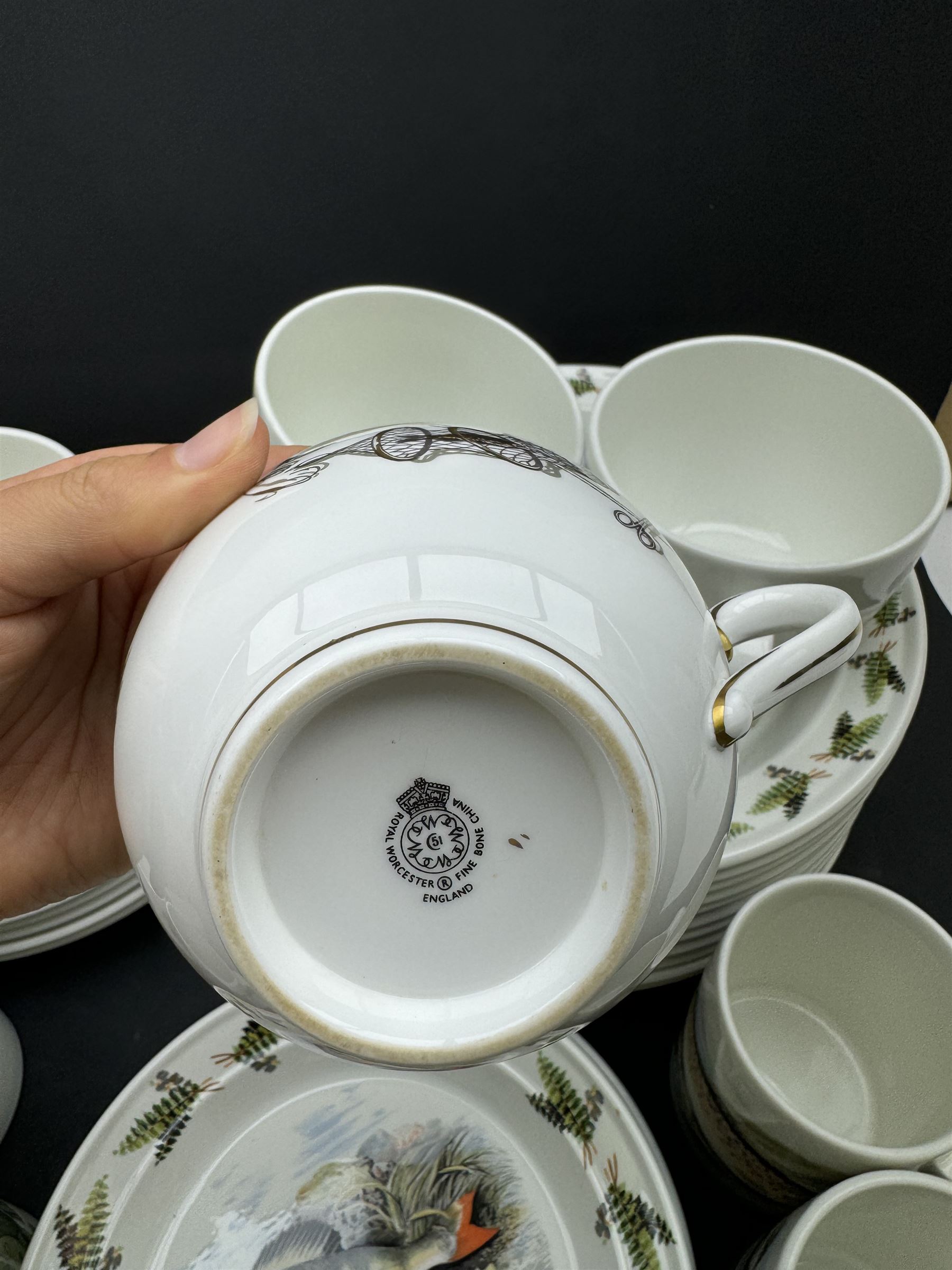 Portmeirion Complete Angler part tea and dinner service, including eleven dinner plates, five bowls, seven mugs etc together with two Royal Worcester cups and saucers