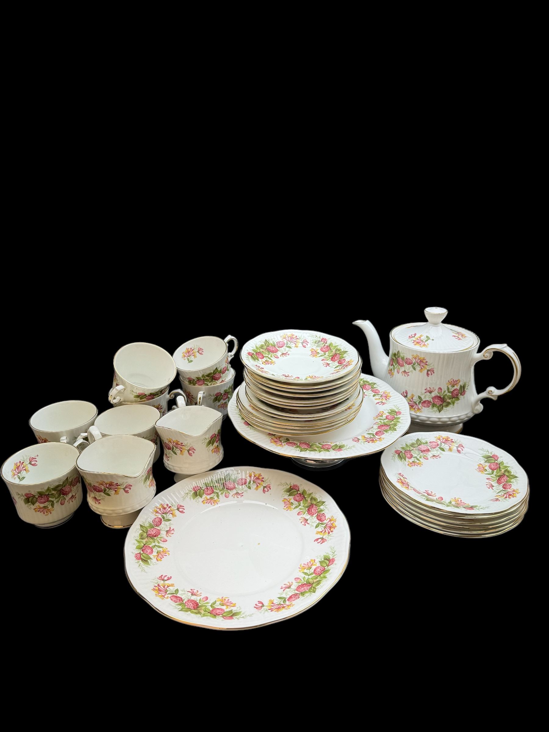 Queens, Woman & Home pattern tea service, including teapot, milk jug, seven teacups etc 