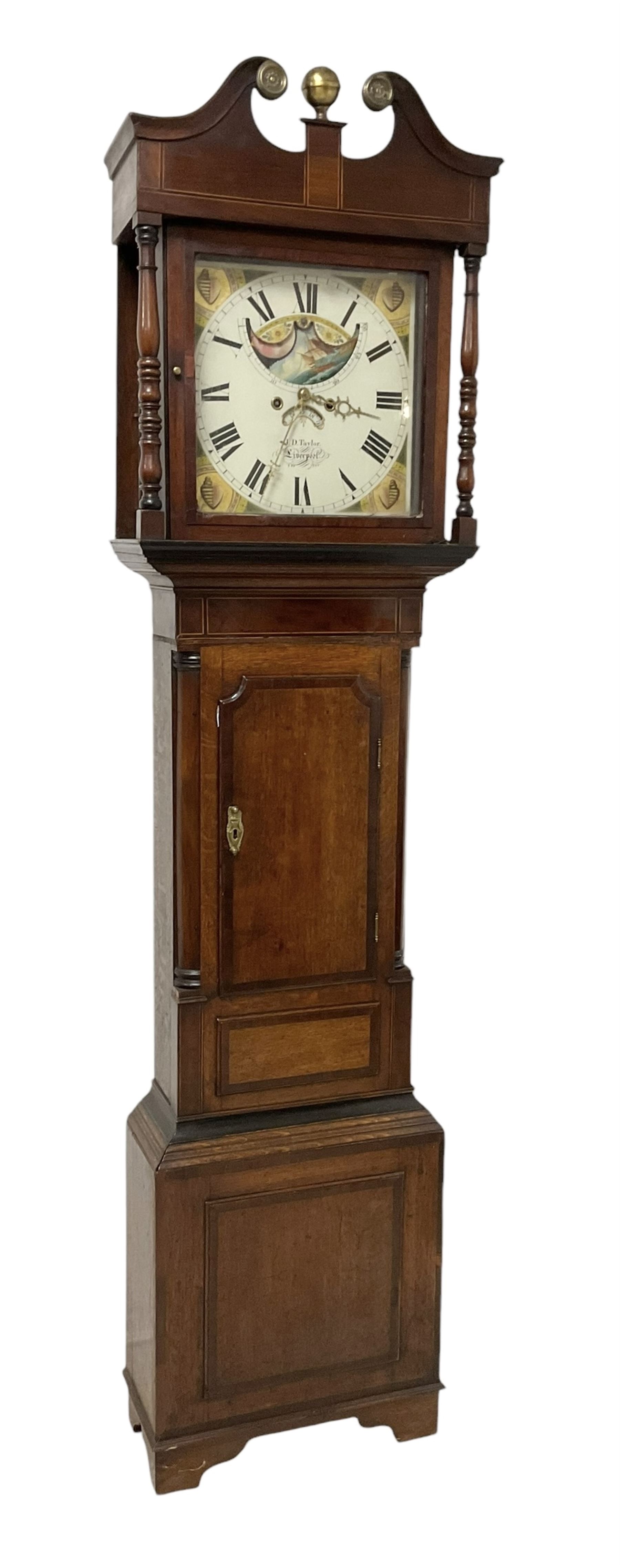 Taylor of Liverpool - mid 19th century 8-day Oak and Mahogany longcase clock with a swans necked pediment and brass ball finial, with a square hood door beneath flanked by turned pilasters, trunk with a short crossbanded door and raised panel on a square plinth raised on bracket feet, painted dial with matching geometric spandrels including depictions of conche shells, Roman numerals, makers name, axe moon disc and calendar aperture, dial pinned via a false plate to a rack striking movement, striking the hours on a bell. With weights and pendulum.