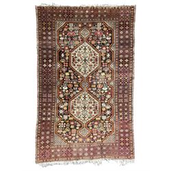 Persian Hamadan dark indigo ground rug, the field decorated with two connected pole medallions, decorated all over with small geometric and stylised bird motifs, geometric design border with repeating pattern 