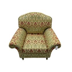 Traditional design two seat sofa, high back with scrolled arms, upholstered in beige fabric with red and green damask motifs, on castor supports (L178cm, D100cm, H89cm); matching armchair (L109cm, D89cm, H89cm)