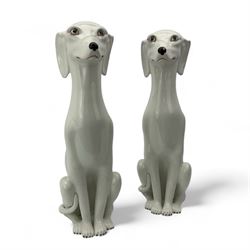 Two mid century Italian white glazed Greyhound models, both seated, H52cm 