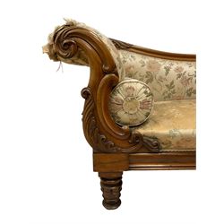 Victorian rosewood chaise longue, rolled back rest and shaped cresting rail carved with curled leaves and scrolls, upholstered in floral pattern fabric with bolster cushion, moulded lower rail with rectangular panel, on turned and lappet carved feet