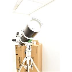 Sky Watcher 200P Newtonian 10” reflector telescope, NEQ3 tripod with counter weights, equatorial mount and finder scope, with a basic 1.25” smartphone adapter and accessories including a Super 10 long eye relief , Celestron 10mm lens, 2 x 1. Barlow lens and super 25 wide angle long eye relief lens. With assembly instruction manual and astronomical telescope user guide.