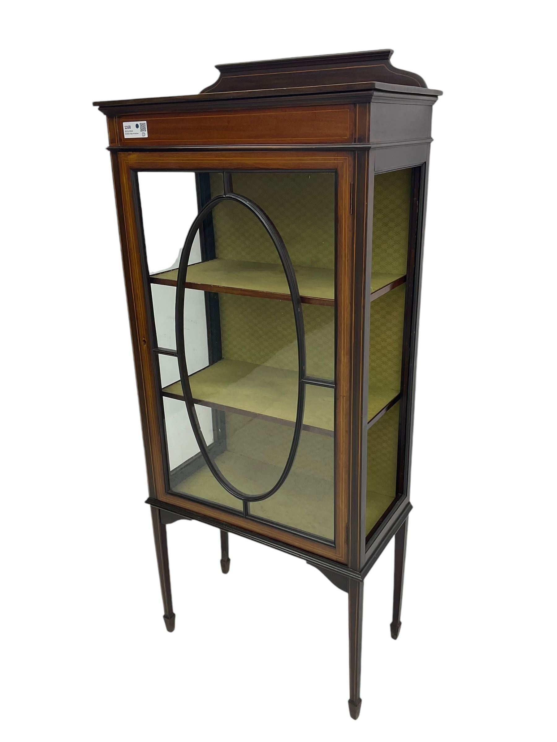 Edwardian inlaid mahogany display cabinet, shaped and raised back over single astragal glazed door, interior lined and fitted with two shelves, raised on square tapering supports