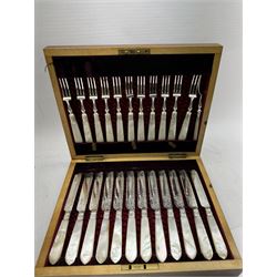 Set of twelve early 20th century century mother of pearl handled and silver plated fruit knives and forks, housed in a satin and velvet lined mahogany case, together with a 