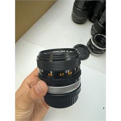 Seventeen Canon camera lenses, mostly FD examples, including 28-85mm 1:4 serial no, 49881, 35-105mm 1:3.5-4.5 serial no. 87632 and 135mm 1:2.8 serial no. 48336, one boxed