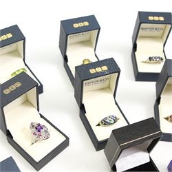 Twelve silver gemset rings, including a jet ring with Celtic design shoulders and a garnet two row cluster ring, amethyst cluster ring and an early 20th century citrine ring