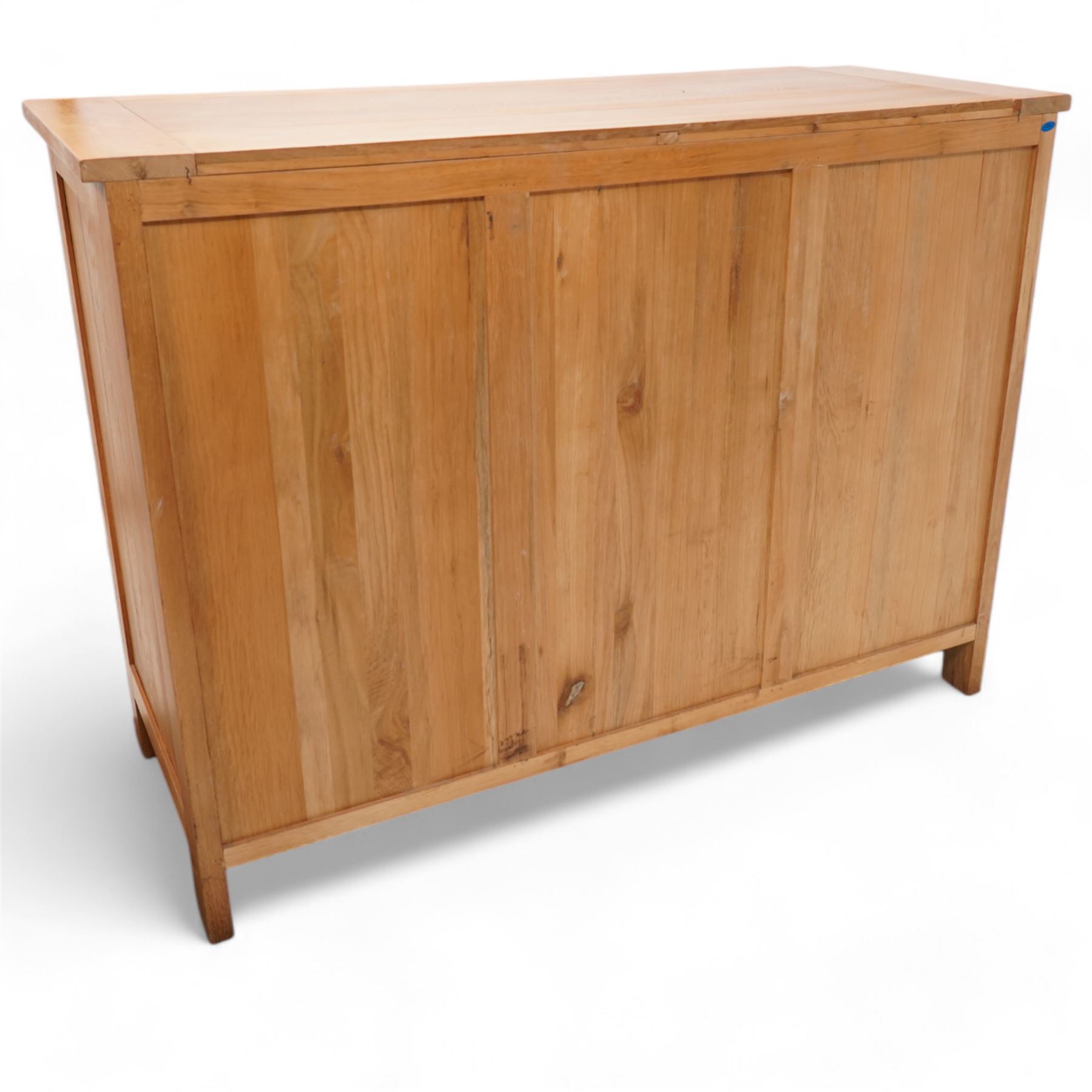 Light oak sideboard, fitted with three drawers and two cupboards