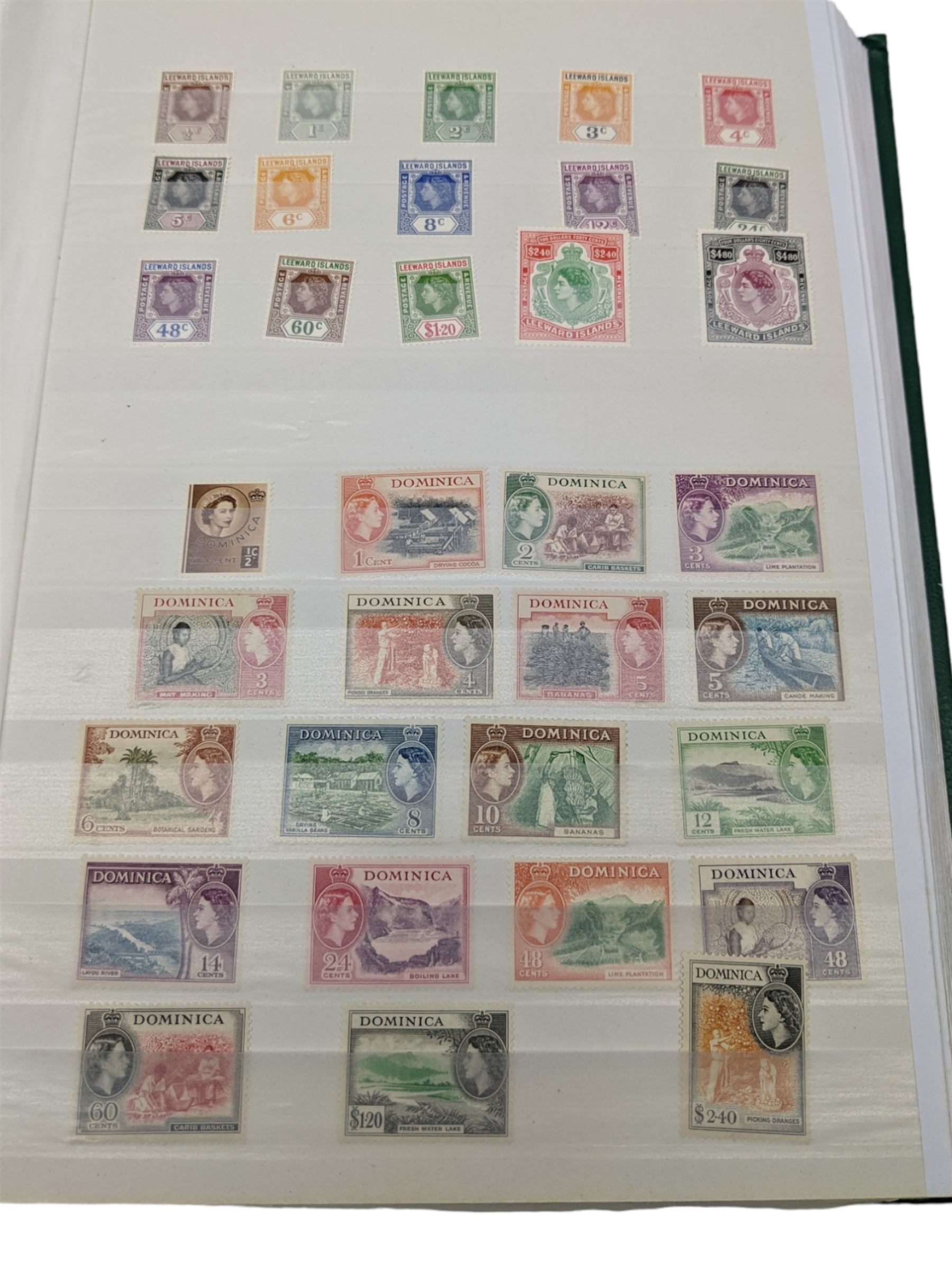 Mostly Commonwealth or Empire stamps including Queen Elizabeth II Northern Rhodesia, Nyasaland, Solomon Islands, Aden, Bermuda, Grenada 'Associated Statehood' overprints, King George VI Falkland Islands Dependencies with values to one shilling etc, mixture of mint and used, housed in a green stockbook