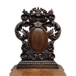 19th century oak hall chair, shaped and pierced back carved with crown cresting over curled and scrolled acanthus leaves, tapered rectangular seat with foliate carved corners and fluted chamfered edge, on turned and lobe carved splayed supports 